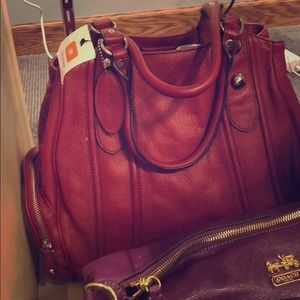Dark red Wilson’s leather brand new purse